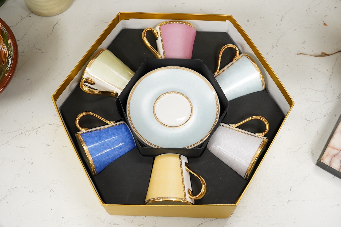 A Royal Collection of Faberge set of six bone china cups and saucers, boxed